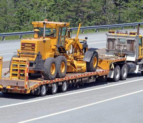 transporting-construction-equipment-moving-massive-machinery-hero